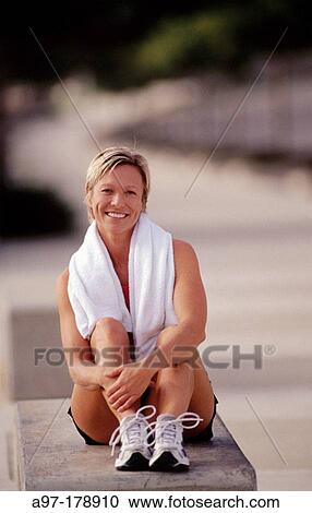 Woman resting after workout View Large Photo Image Stock Image - Woman resting after workout. Fotosearch
