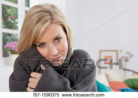 Woman resting her head in her hands View Large Photo Image Stock Photography - Woman resting her head in her hands. Fotosearch