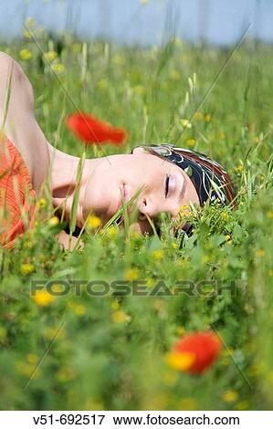 Woman resting in the countryside View Large Photo Image Stock Photo - Woman resting in the countryside. Fotosearch