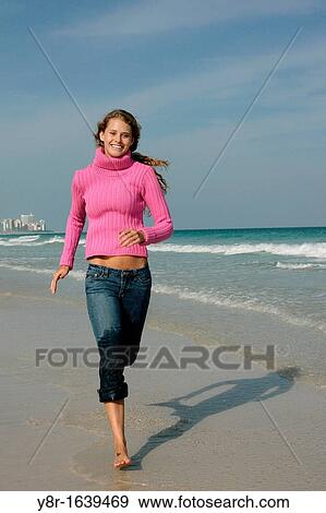 Stock Photo - woman running. Fotosearch