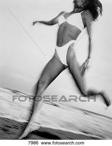 Woman running View Large Photo Image Stock Photograph - Woman running. Fotosearch