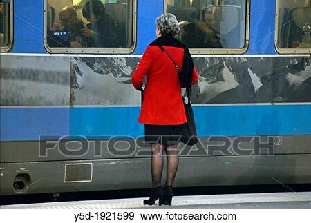 woman saying good-bye on the train platform, Paris Austerlitz train station View Large Photo Image Stock Photo - woman saying good-bye on the train platform, Paris Austerlitz train station. Fotosearch