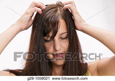 woman scratching her itching scalp View Large Photo Image Stock Image - woman scratching her itching scalp. Fotosearch