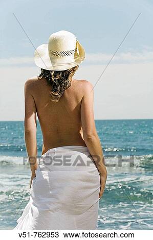 woman, sea, back, young adult View Large Photo Image Stock Image - woman, sea, back, young adult. Fotosearch