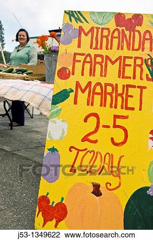 Woman selling produce at farmers market, Miranda California View Large Photo Image Stock Image - Woman selling produce at farmers market, Miranda California. Fotosearch