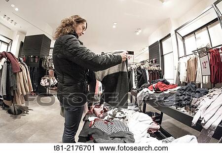 Woman shopping, offers or discounts, valencia, spain View Large Photo Image Stock Image - Woman shopping, offers or discounts, valencia, spain. Fotosearch