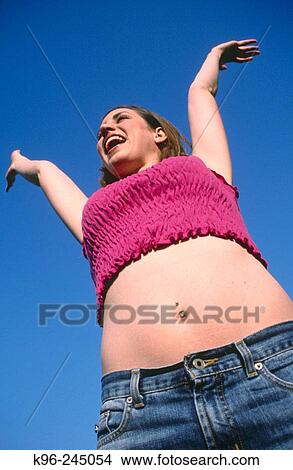 Woman shouting, celebrating View Large Photo Image Picture - Woman shouting, celebrating. Fotosearch