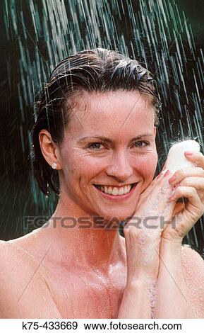 Stock Photo - Woman showering. Fotosearch