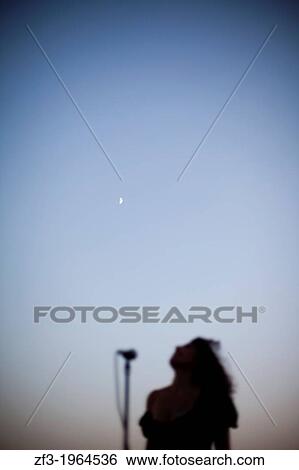 Woman singing outdoors. View Large Photo Image Stock Photograph - Woman singing outdoors.. Fotosearch