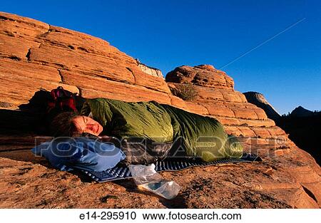 Woman sleeping at Zion National Park. Utah, USA View Large Photo Image Stock Image - Woman sleeping at Zion National Park. Utah, USA. Fotosearch