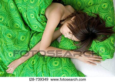 woman sleeping in bed View Large Photo Image Stock Photo - woman sleeping in bed. Fotosearch
