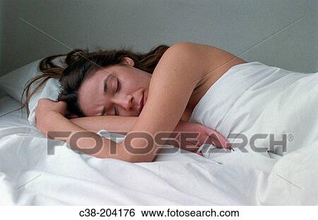 Woman sleeping View Large Photo Image Stock Photograph - Woman sleeping. Fotosearch
