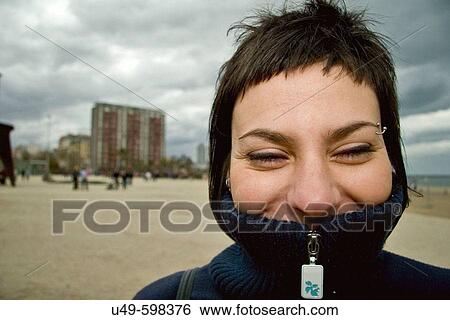 Stock Photograph - Woman smiling. Barceloneta. Barcelona. Catalonia. Spain.. Fotosearch