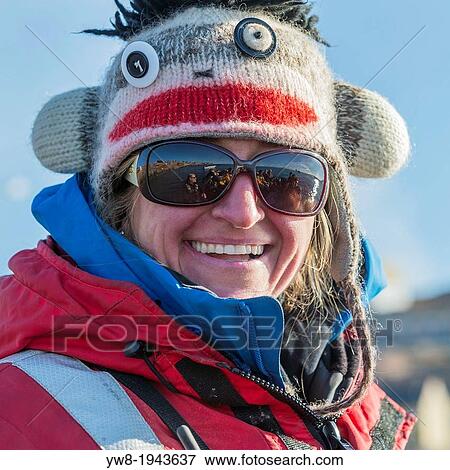 Woman smiling dressed for arctic weather, Scoresbysund, Greenland. View Large Photo Image Stock Photo - Woman smiling dressed for arctic weather, Scoresbysund, Greenland.. Fotosearch