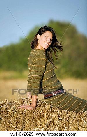 woman smiling in the countryside View Large Photo Image Stock Photo - woman smiling in the countryside. Fotosearch