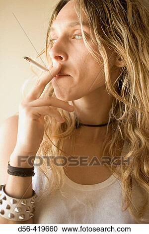 Stock Image - Woman smoking. Fotosearch