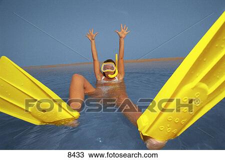Woman snorkeling View Large Photo Image Stock Image - Woman snorkeling. Fotosearch