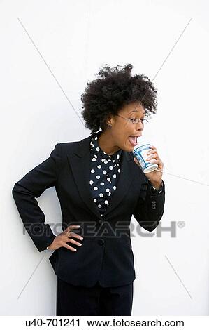 Woman speaking on cup with string phone View Large Photo Image Stock Image - Woman speaking on cup with string phone. Fotosearch