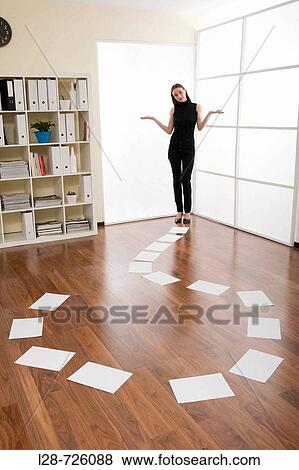 woman standing behind the shape of question mark View Large Photo Image Stock Photo - woman standing behind the shape of question mark. Fotosearch