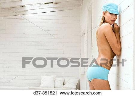 Woman standing in underwear View Large Photo Image Stock Image - Woman standing in underwear. Fotosearch