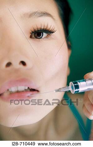 Stock Photo - Woman. Fotosearch