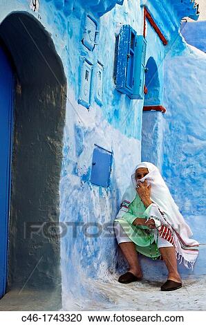 Woman, Street, Chefchaouen Rif region, Morocco. View Large Photo Image Stock Image - Woman, Street, Chefchaouen Rif region, Morocco.. Fotosearch