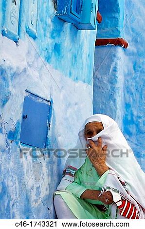 Woman, Street, Chefchaouen Rif region, Morocco. View Large Photo Image Stock Image - Woman, Street, Chefchaouen Rif region, Morocco.. Fotosearch