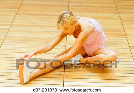 Woman stretching View Large Photo Image Stock Image - Woman stretching. Fotosearch