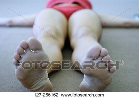 Stock Image - Woman stretching. Fotosearch