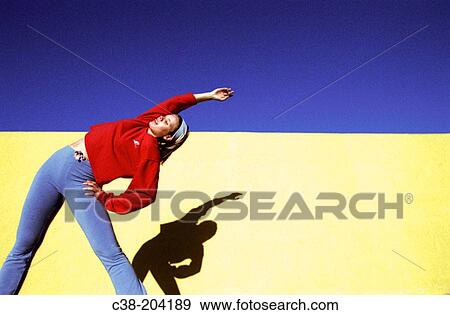 Woman stretching View Large Photo Image Stock Photo - Woman stretching. Fotosearch