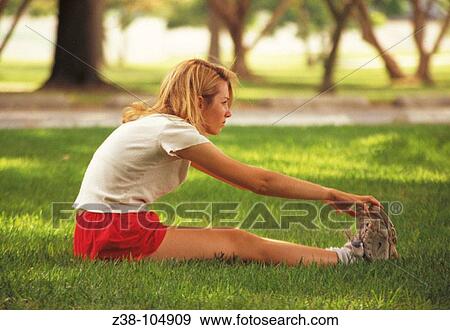Woman stretching View Large Photo Image Stock Photo - Woman stretching. Fotosearch