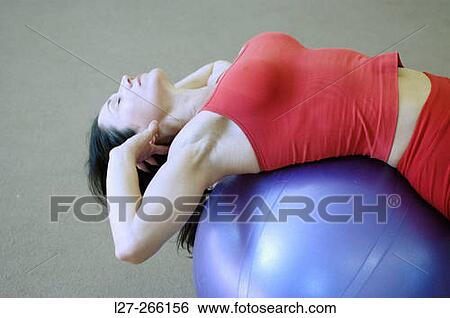 Stock Photograph - Woman stretching. Fotosearch