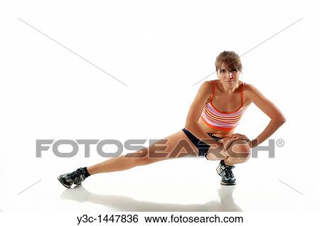 Stock Photograph - Woman stretching. Fotosearch