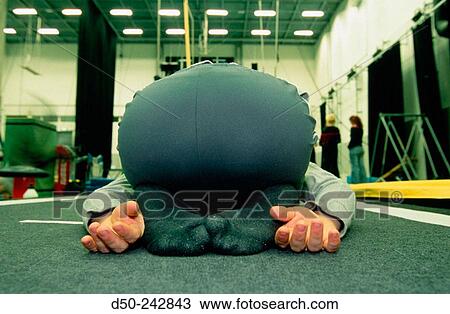 Stock Image - Woman stretching. Stockholm. Sweden. Fotosearch