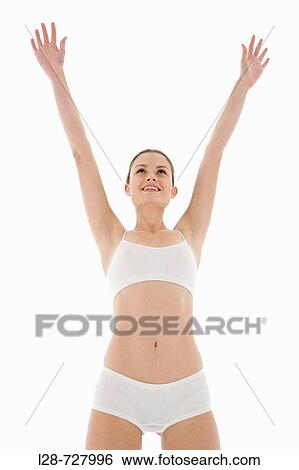 woman stretching, studio shot View Large Photo Image Stock Photograph - woman stretching, studio shot. Fotosearch