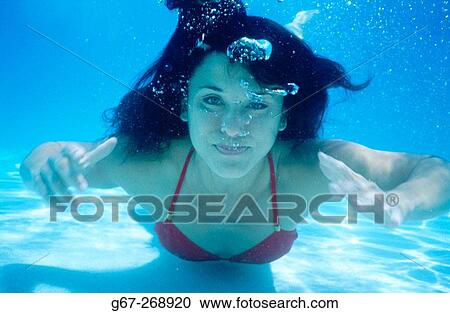 Woman swimming. Miami Beach. Florida. USA View Large Photo Image Stock Image - Woman swimming. Miami Beach. Florida. USA. Fotosearch