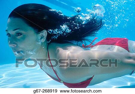 Woman swimming. Miami Beach. Florida. USA View Large Photo Image Stock Photo - Woman swimming. Miami Beach. Florida. USA. Fotosearch