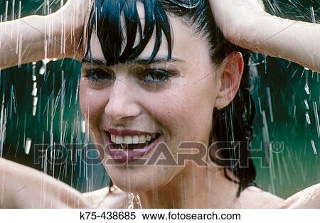 Woman taking a shower View Large Photo Image Stock Photography - Woman taking a shower. Fotosearch