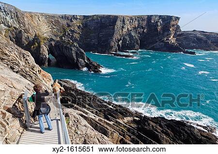 Woman taking photographs of Mizen Head, County Cork, Republic of Ireland View Large Photo Image Stock Image - Woman taking photographs of Mizen Head, County Cork, Republic of Ireland. Fotosearch