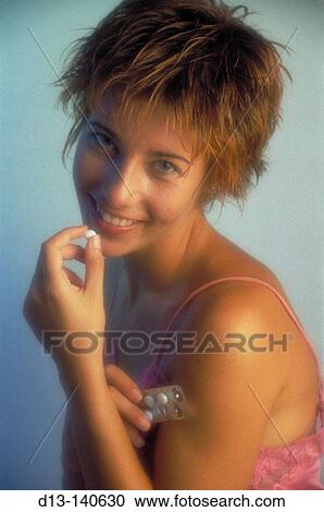 Woman taking pill View Large Photo Image Stock Image - Woman taking pill. Fotosearch