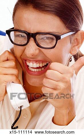 Picture - Woman talking on phone. Fotosearch