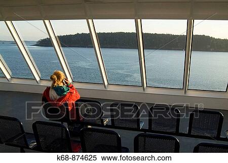 woman talking on phone, view of Gulf Islands from ferry, BC, Canada View Large Photo Image Stock Photography - woman talking on phone, view of Gulf Islands from ferry, BC, Canada. Fotosearch
