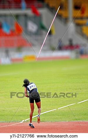 Woman throwing javelin. View Large Photo Image Stock Photograph - Woman throwing javelin.. Fotosearch
