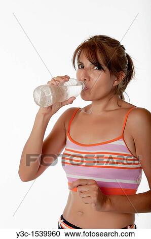 Woman tired after fitness workout View Large Photo Image Stock Image - Woman tired after fitness workout. Fotosearch