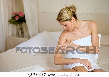 Woman touching her skin View Large Photo Image Stock Photo - Woman touching her skin. Fotosearch