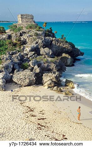 Picture - Woman tourist on Tulum beach Mexico Yucatan, Mexico. Fotosearch