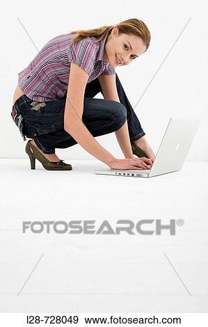 Stock Photo - woman using computer. Fotosearch
