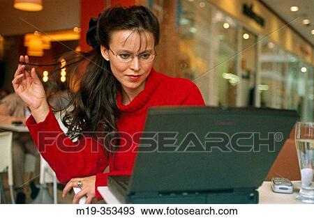 Woman using laptop View Large Photo Image Stock Image - Woman using laptop. Fotosearch