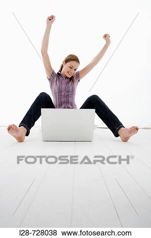 Stock Photo - woman using laptop. Fotosearch