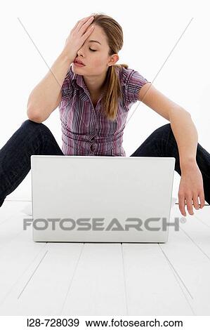 Stock Photo - woman using laptop. Fotosearch